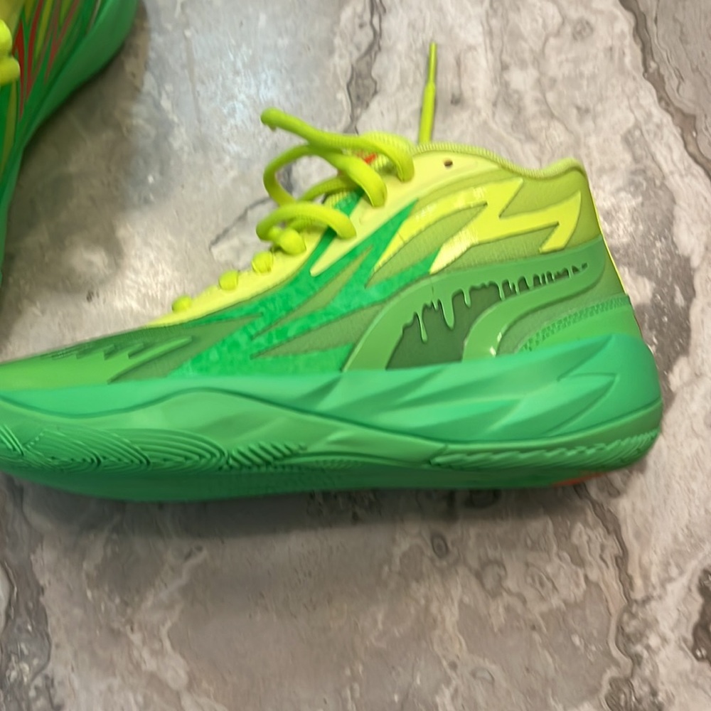 Brand new in box melo sneakers.